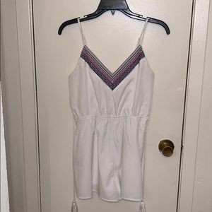 White romper with tassels